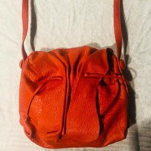 Carlos Falchi buffalo bag  in corvette red
